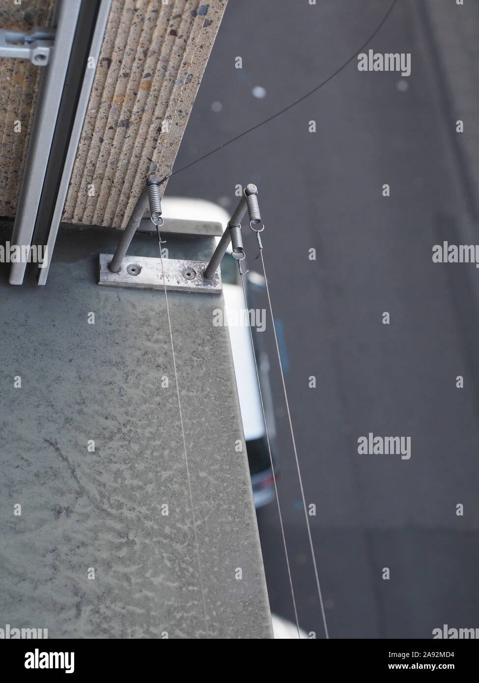 bird wire deterrent on a window sill Stock Photo Alamy