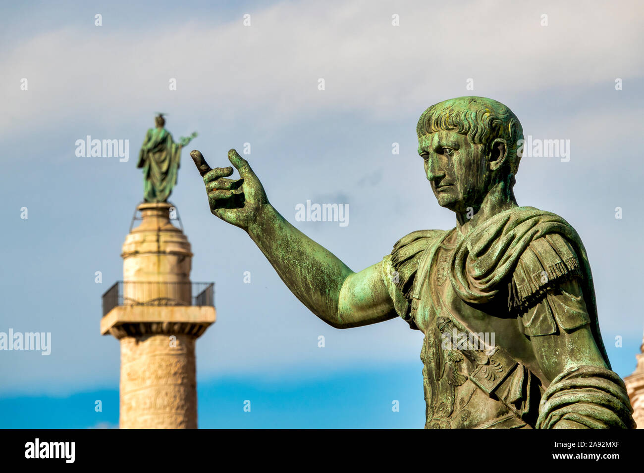 Statue and Column of Emperor Trajan in via dei Fori Imperiali, Rome Italy Stock Photo