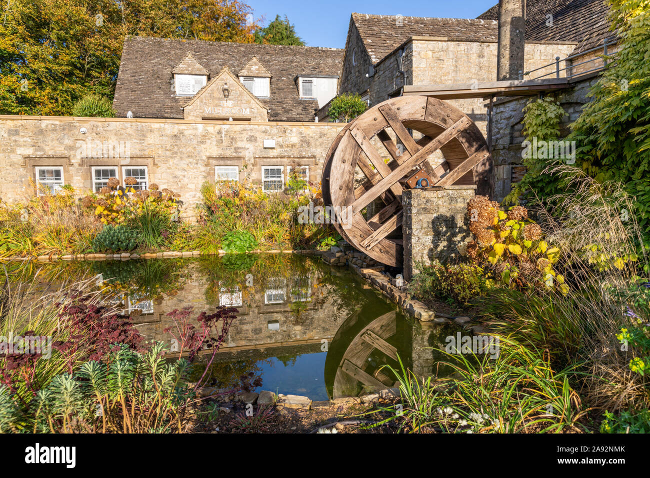 Autumn sunlight on the Frogmill pub, hotel and restaurant near the Cotswold village of Shipton Oliffe, Gloucestershire UK Stock Photo