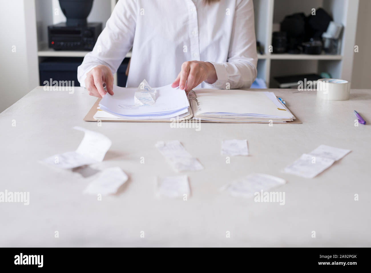 Woman doing paper work Stock Photo