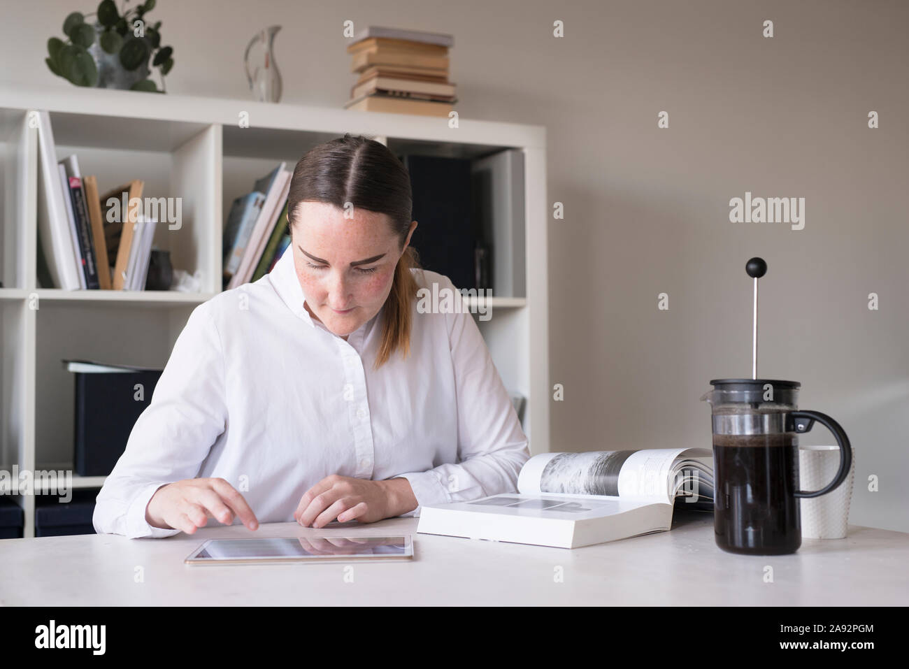 Woman doing paper work Stock Photo