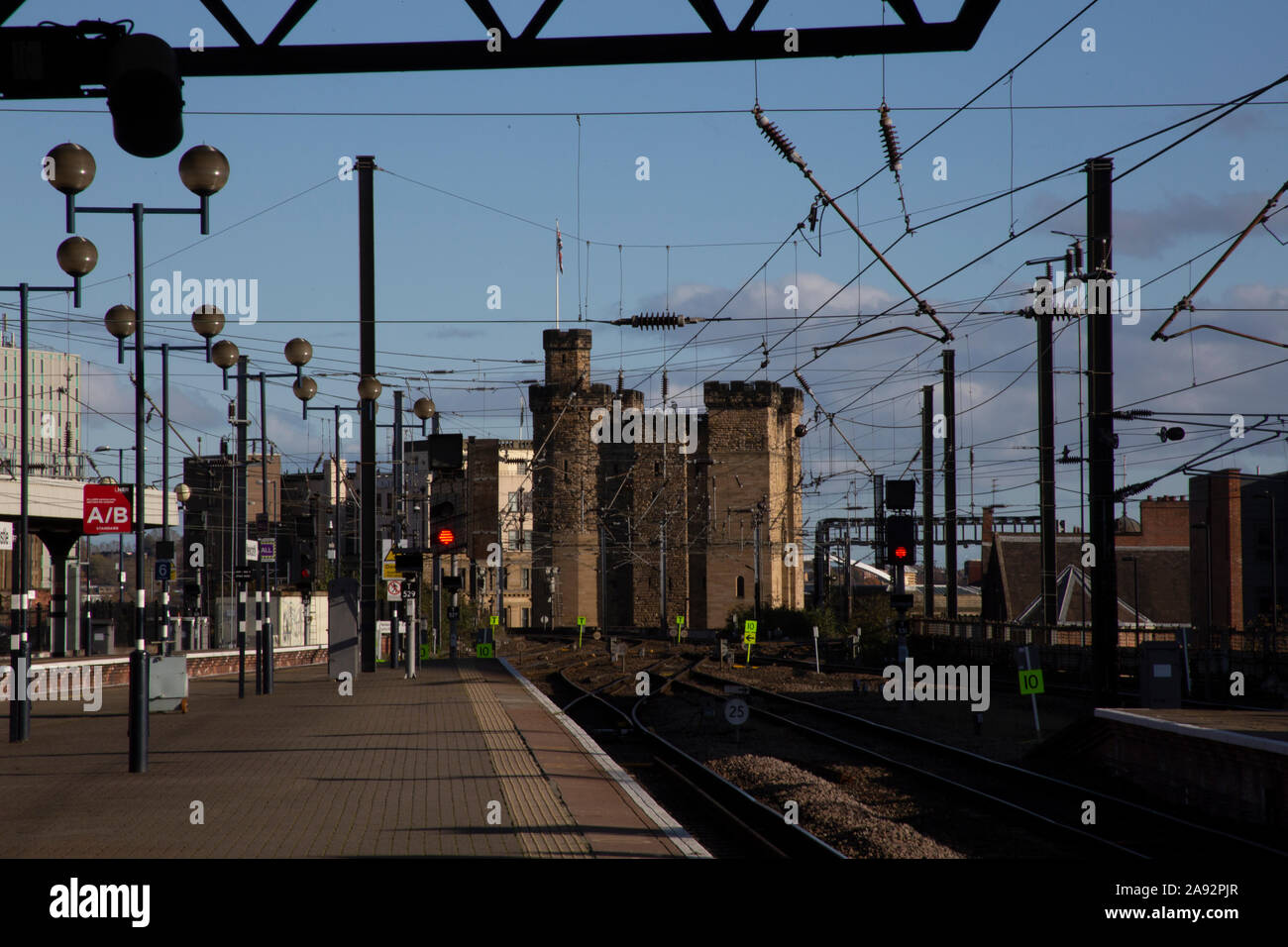 The Castle a medieval fortification, seen from the station platform of Newcastle railway station Newcastle upon Tyne, England, UK Stock Photo