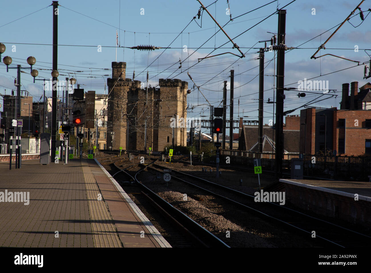 The Castle a medieval fortification, seen from the station platform of Newcastle railway station Newcastle upon Tyne, England, UK Stock Photo