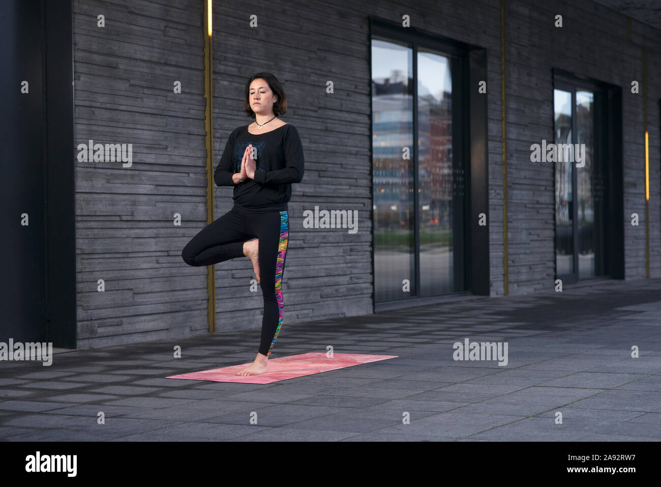 Woman doing yoga Stock Photo