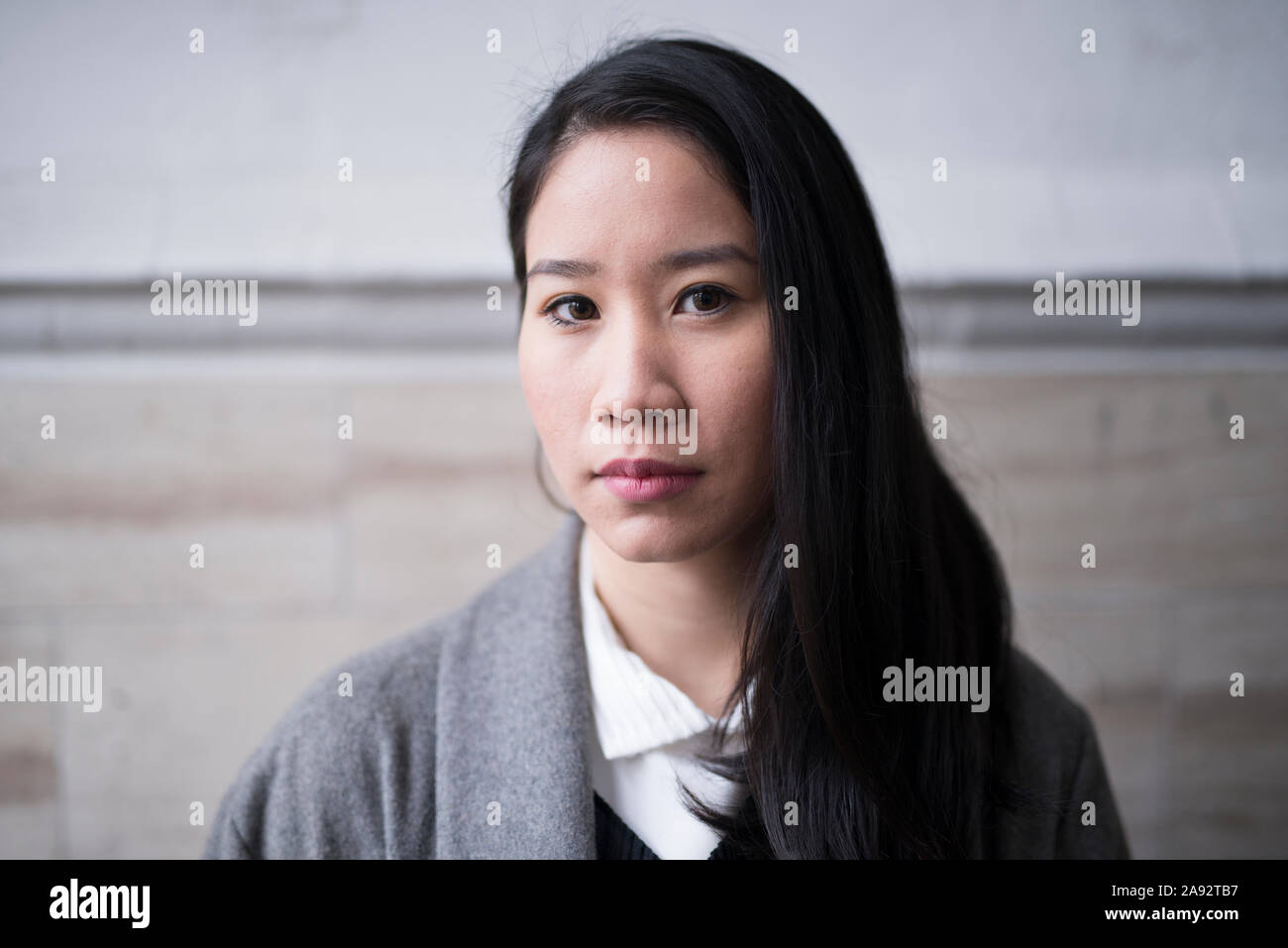 Serious asian woman head hi-res stock photography and images - Alamy
