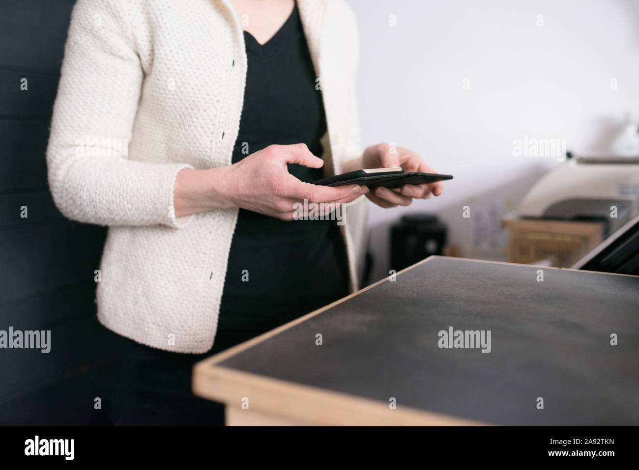 Woman using cell phone Stock Photo
