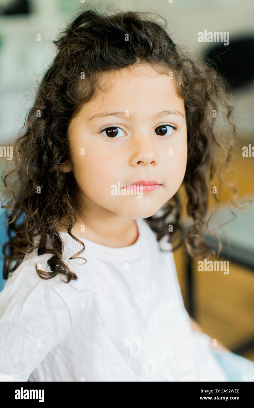 Girls brown curly hair hi-res stock photography and images - Alamy