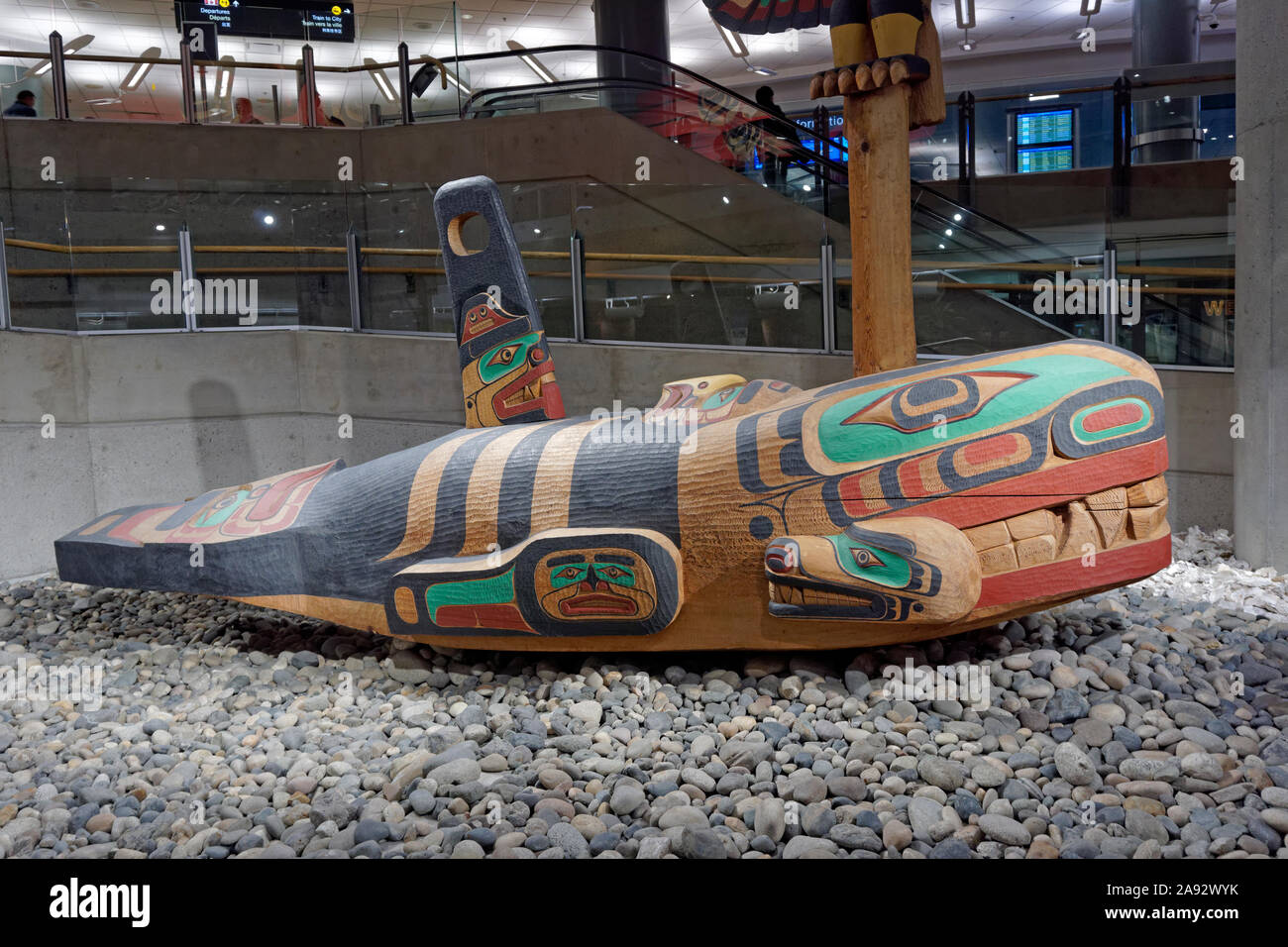 Killer Whale cedar sculpture by Richard Hunt in the domestic terminal of the Vancouver International Airport, Vancouver, BC, Canada Stock Photo