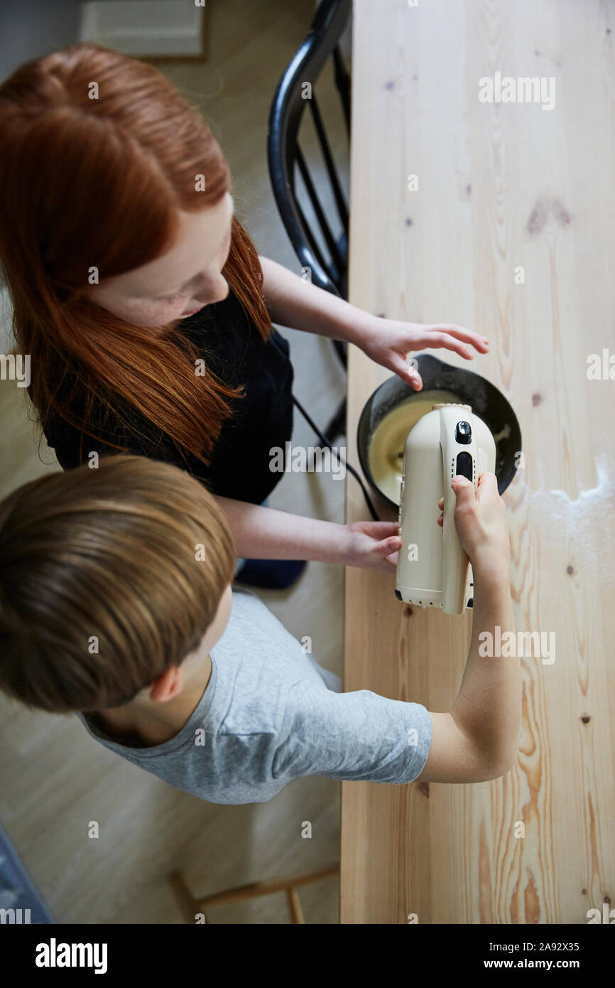 Children using electric mixer Stock Photo Alamy