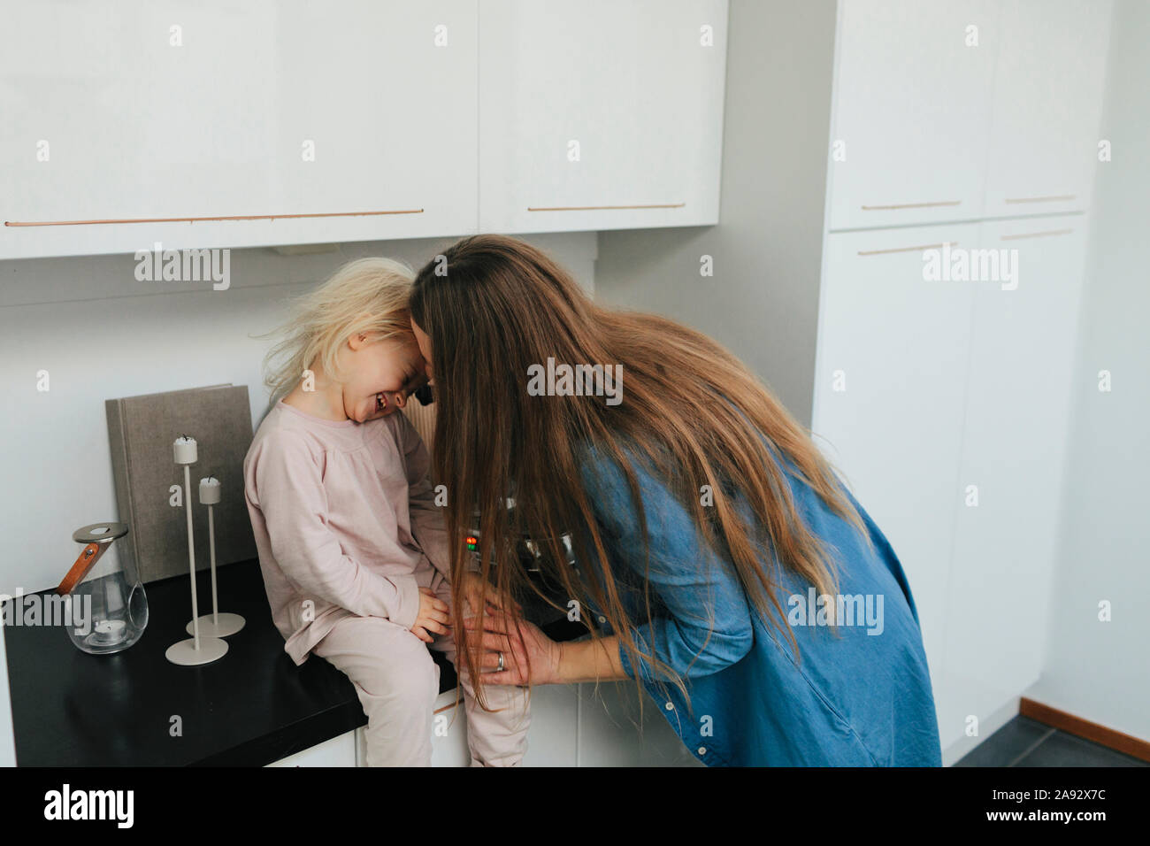 Mother with daughter together Stock Photo