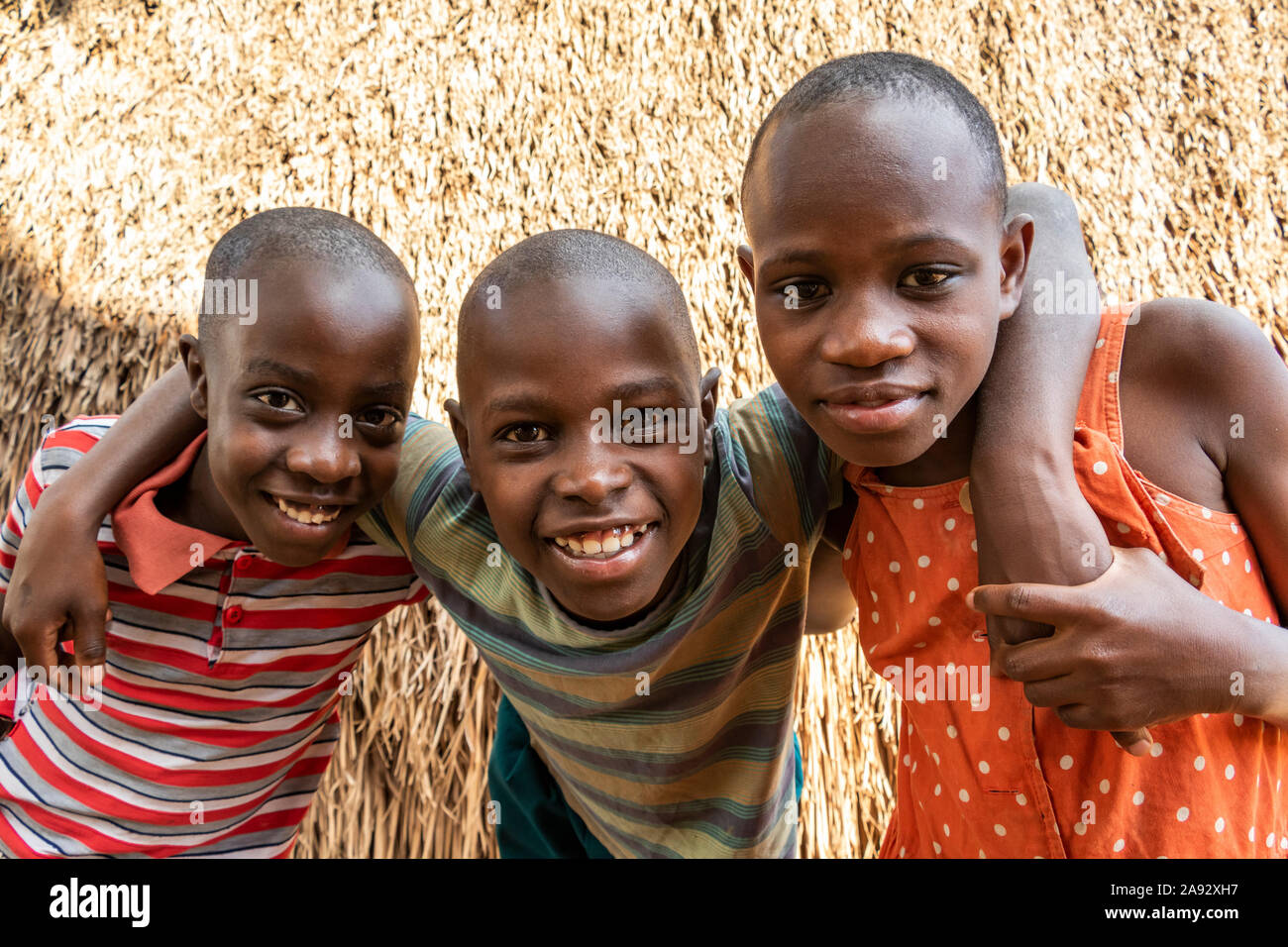 Ugandan children, Tombs of Buganda Kings at Kasubi; Kampala, Central Region, Uganda Stock Photo