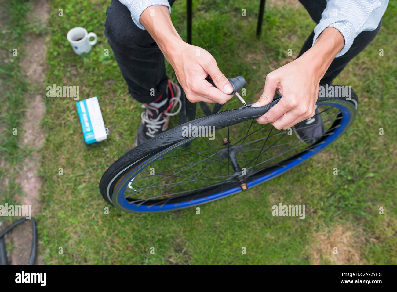 Repairing bicycle wheel Stock Photo