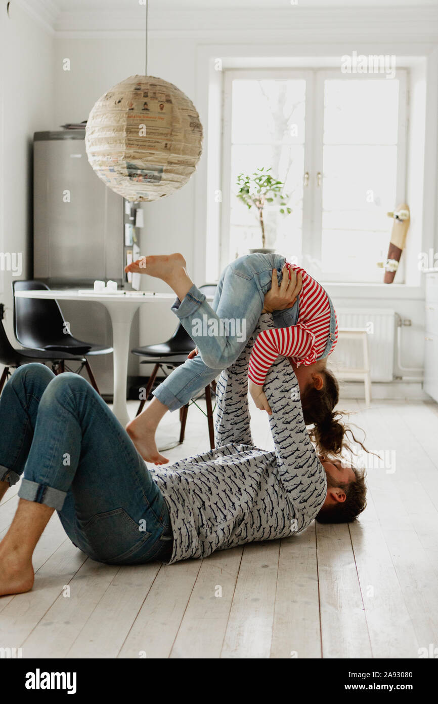 Father playing with daughter Stock Photo