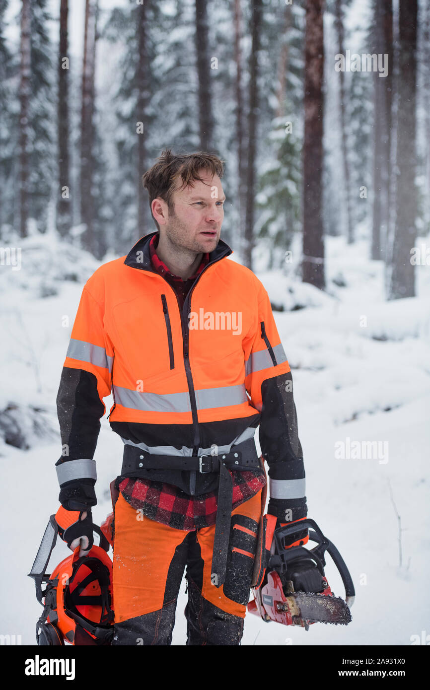 Chainsaw resting on forest hi-res stock photography and images - Alamy
