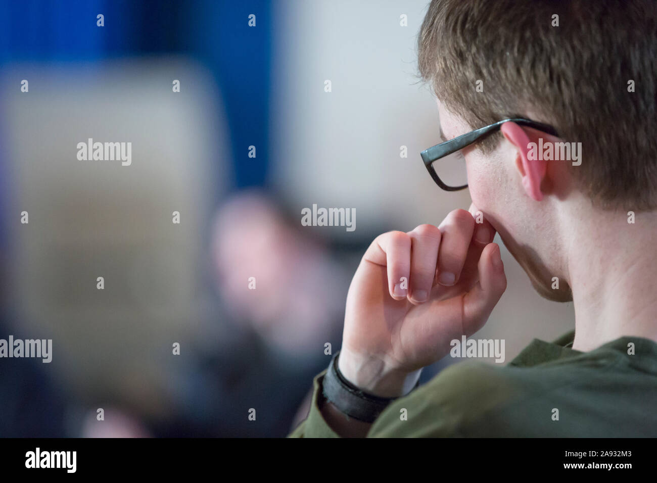 Young man with Cerebral Palsy and Nonverbal learning disorder in a meeting Stock Photo