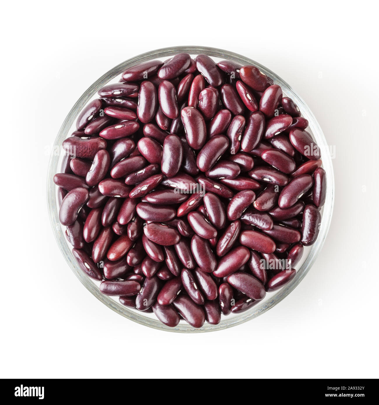 Uncooked red kidney beans in glass bowl isolated on white background