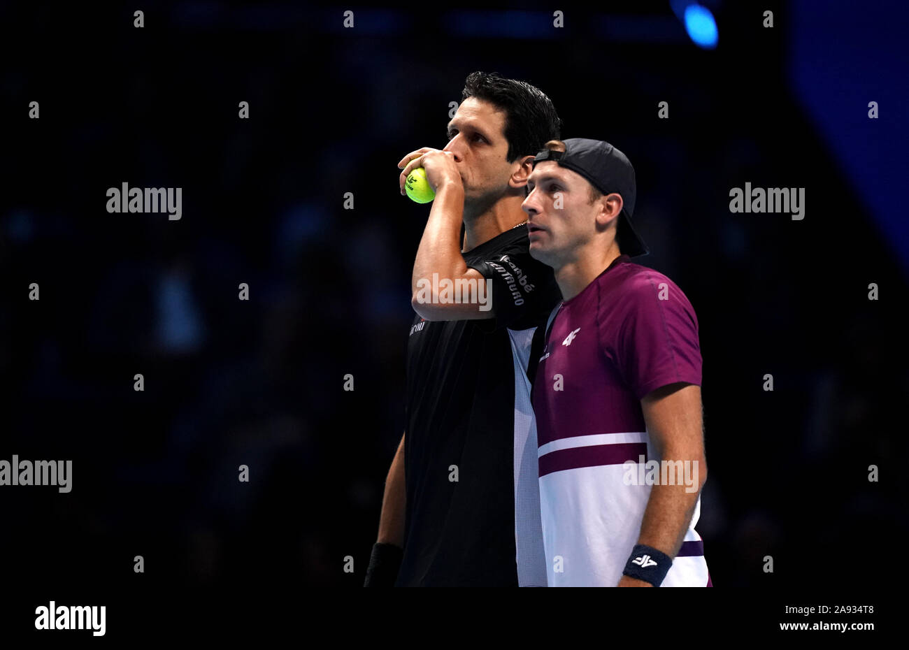 Lukasz Kubot (right) and Marcelo Melo during their doubles match against Raven Klaasen and Michael Venus on day three of the Nitto ATP Finals at The O2 Arena, London. Stock Photo