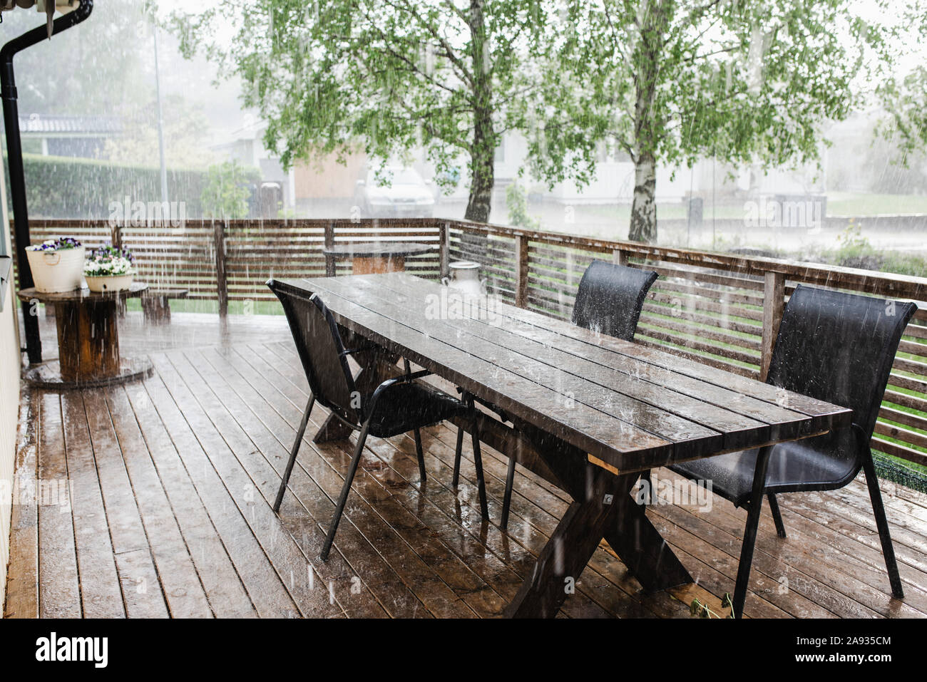 Patio in rain Stock Photo Alamy