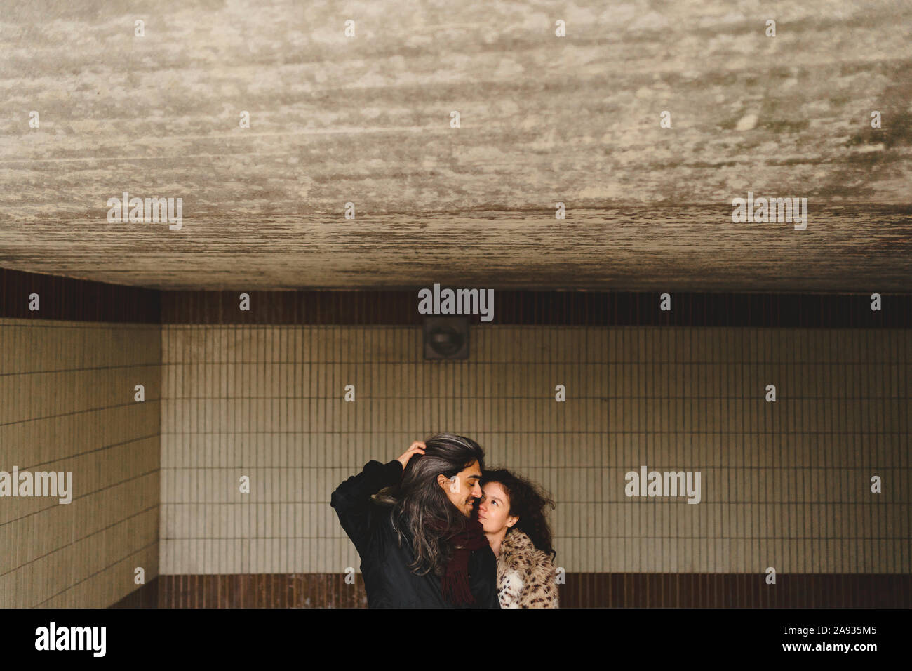 Couple in tunnel Stock Photo