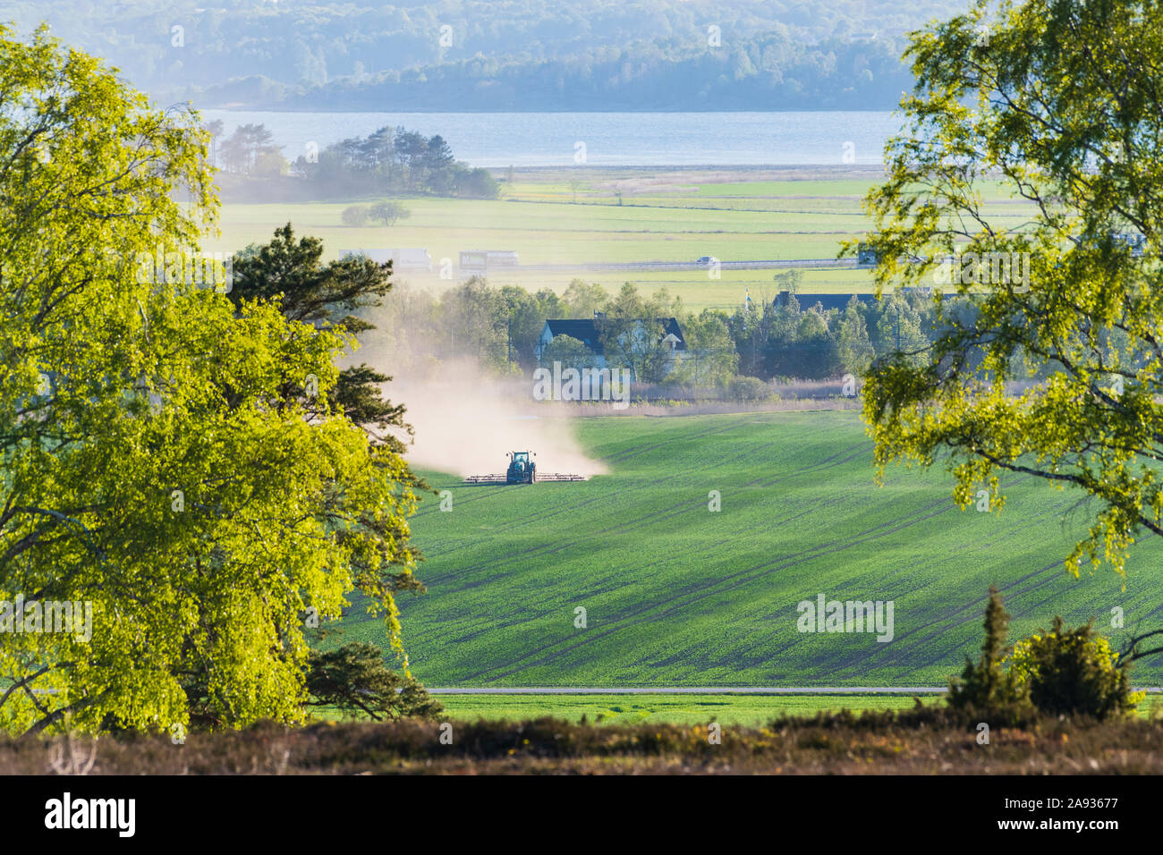 Tractor on field Stock Photo - Alamy
