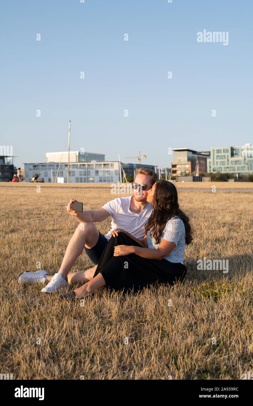 Young couple taking selfie Stock Photo