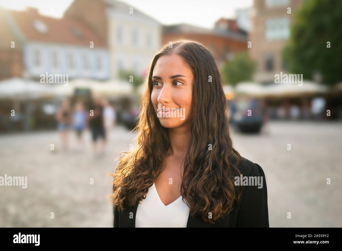 Smiling woman looking away Stock Photo