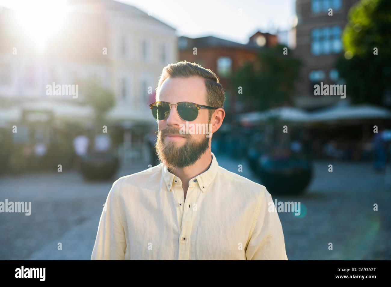 Man with sunglasses on head hi-res stock photography and images - Alamy