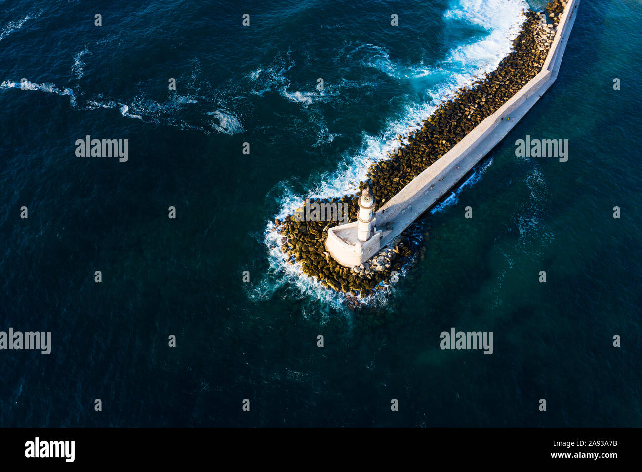 Aerial view of lighthouse and sea Stock Photo