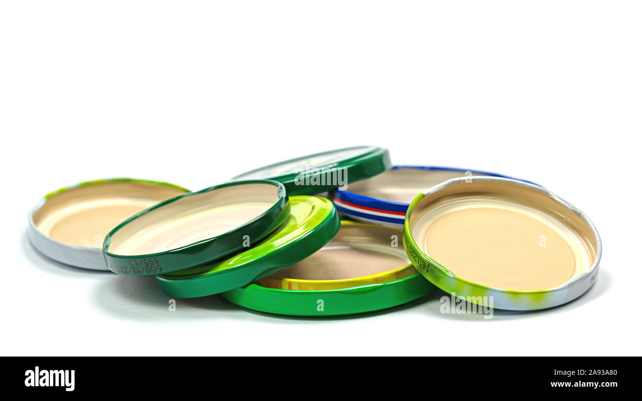 Old canning lid against white background Stock Photo