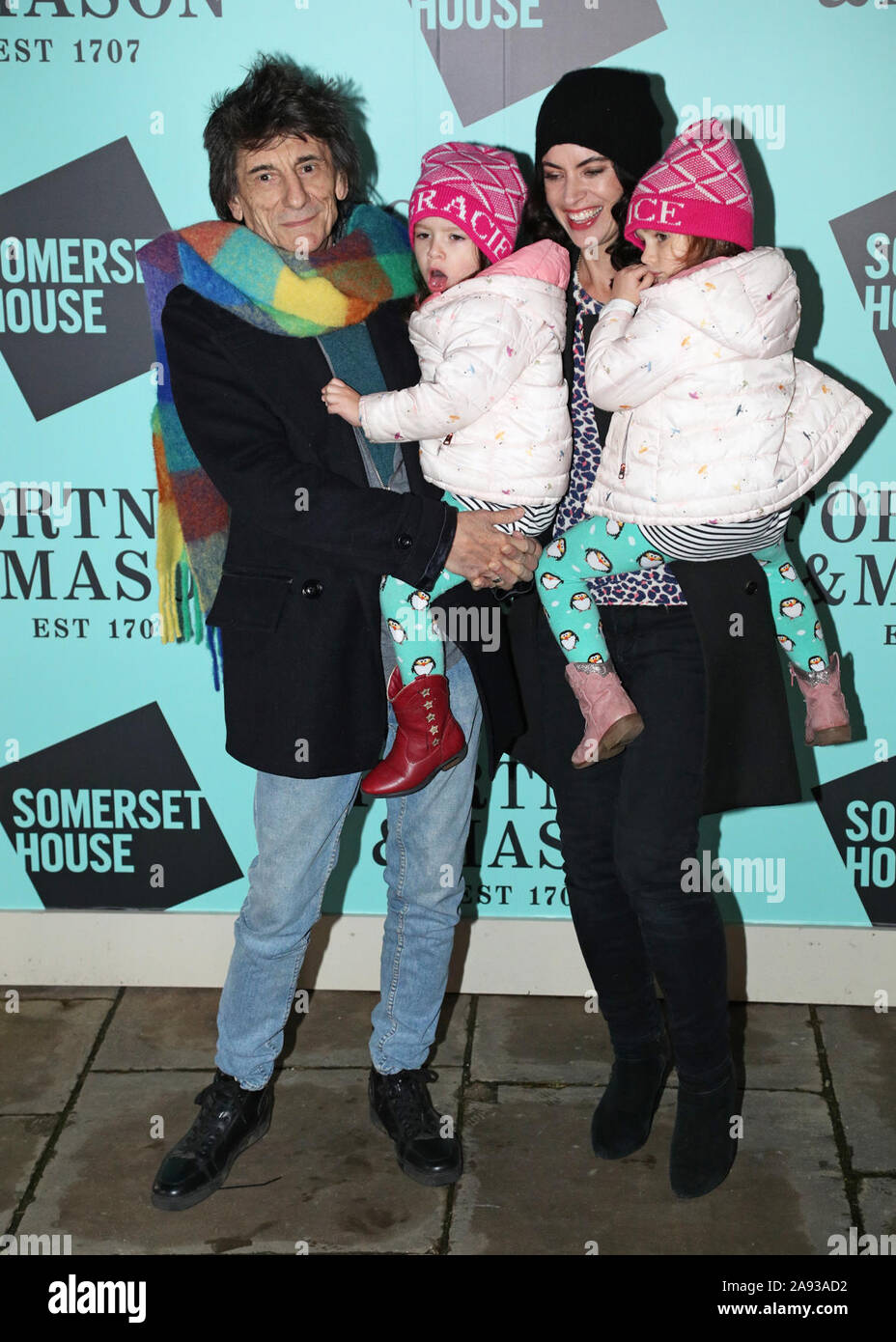 Ronnie Wood with his wife Sally Humphreys and their two daughters Alice(01)