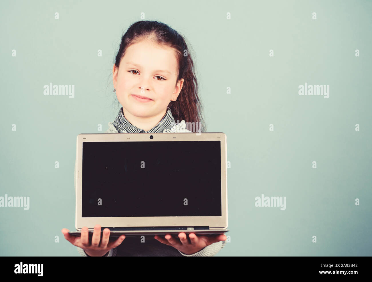 Study programming. Girl with laptop computer. Little child using pc ...