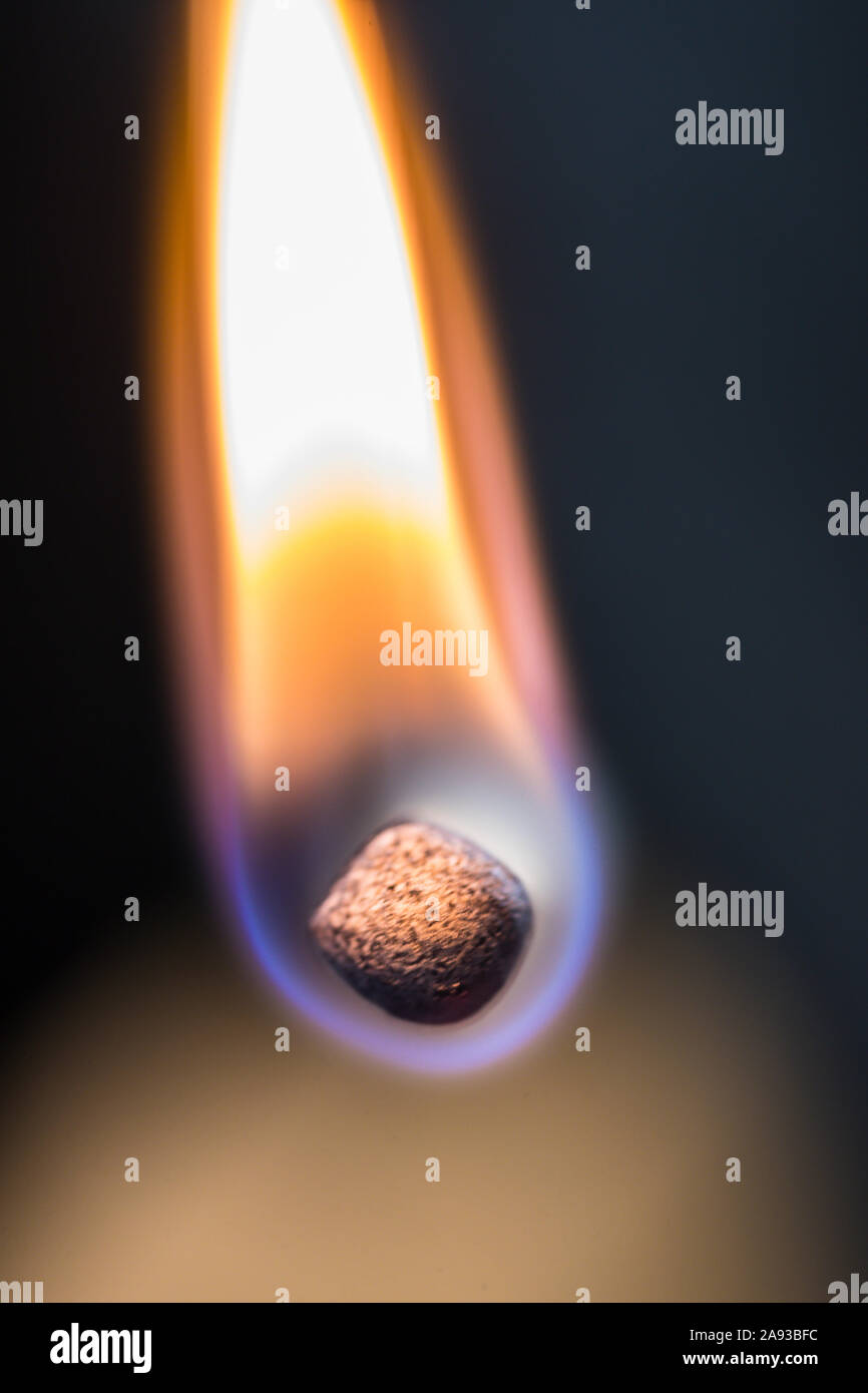 single wooden match burning Stock Photo - Alamy