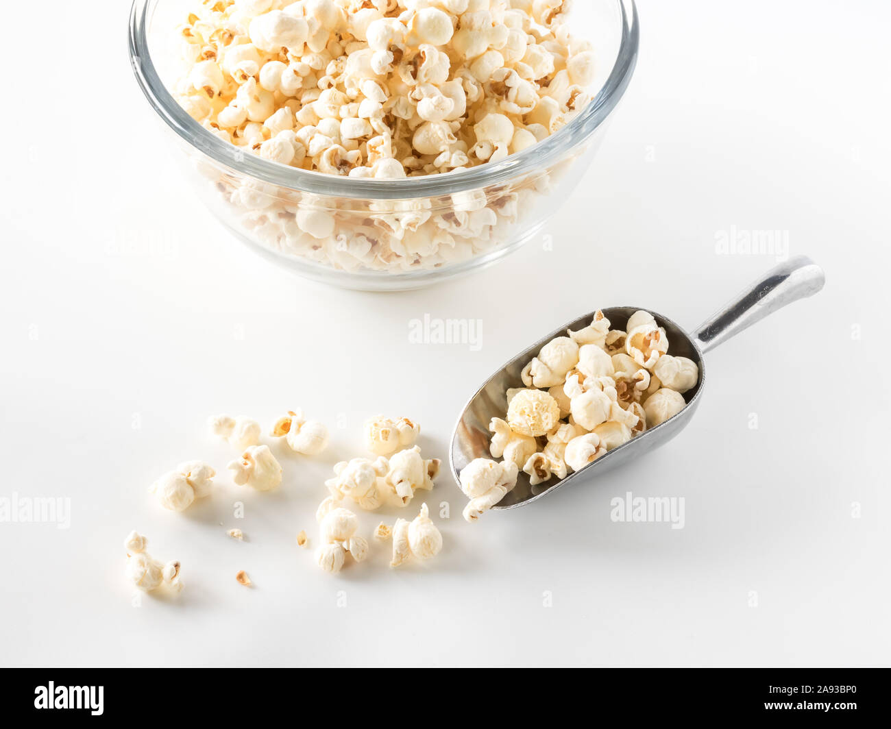 Scoop of white cheddar popcorn. Stock Photo