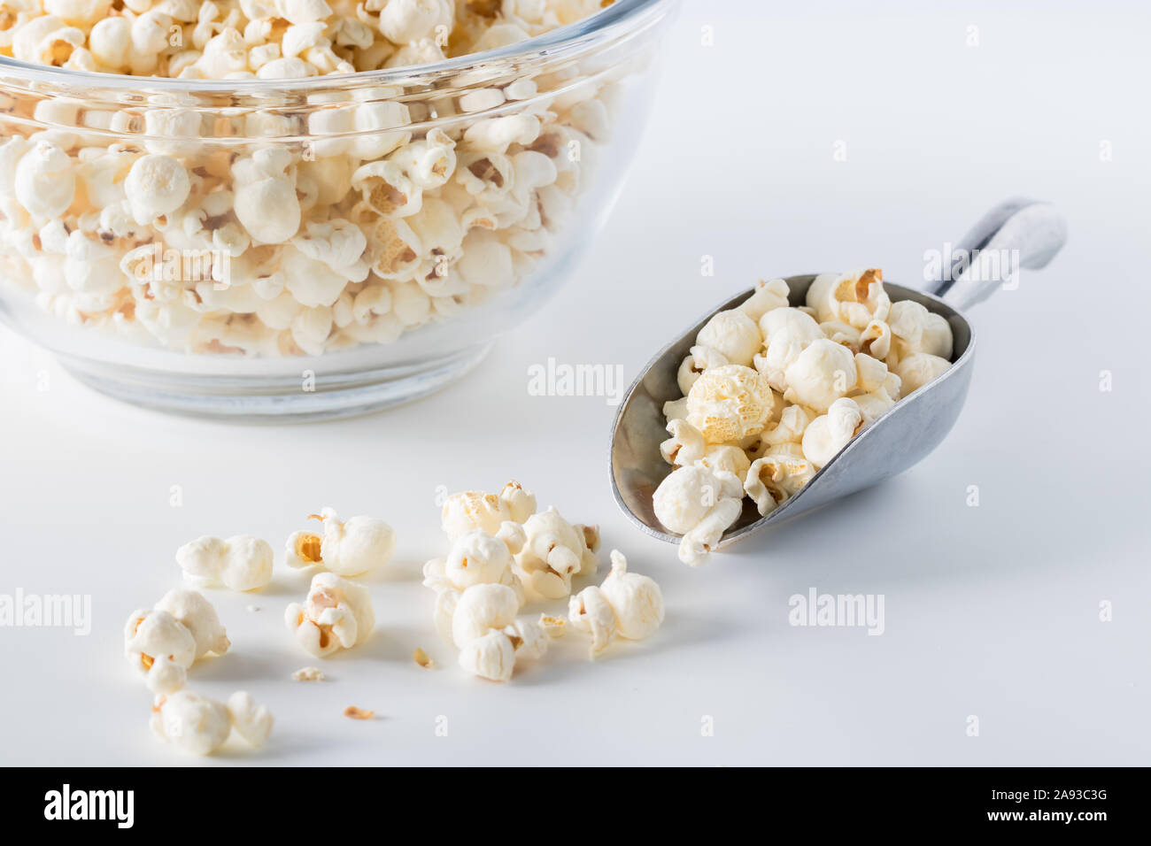 Scoop of white cheddar popcorn. Stock Photo