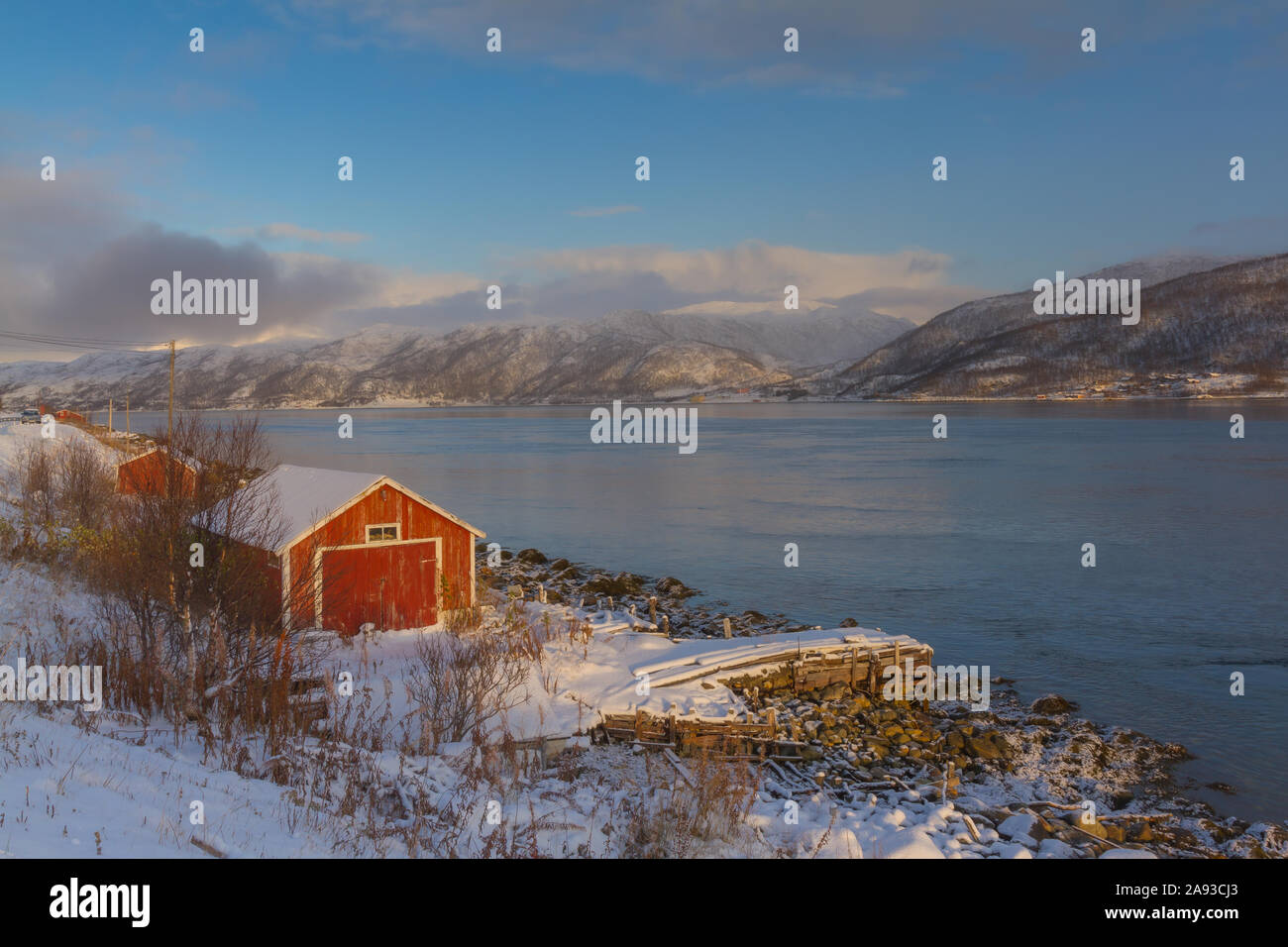 Boat house near Kvaløyvågen in Northern Norway during winter Stock Photo