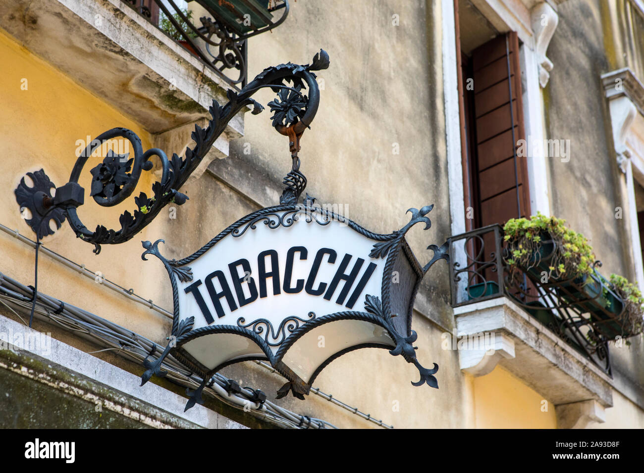 An old-fashioned Tabacchi, or Tobacco, sign above a shop in Venice, Italy. Stock Photo