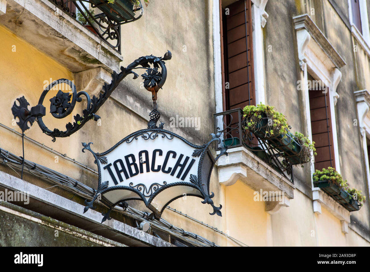 An old-fashioned Tabacchi, or Tobacco, sign above a shop in Venice, Italy. Stock Photo