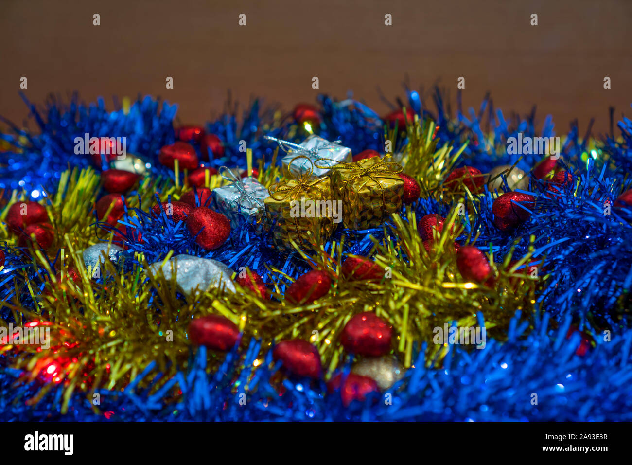 Christmas gift packages in the middle of the decorations Stock Photo