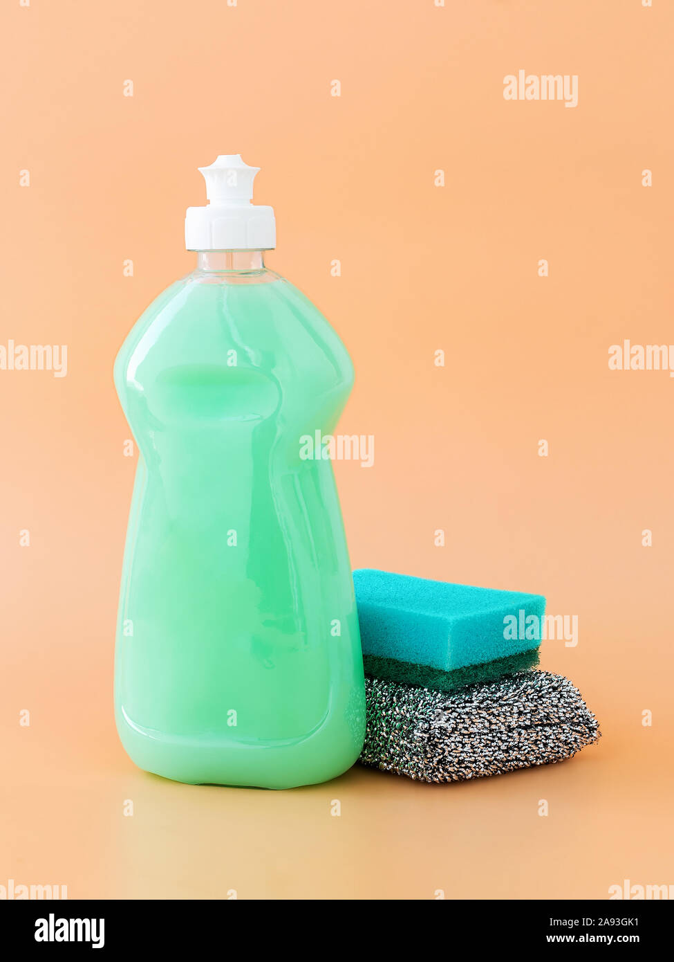 Concept of Dishwashing detergent accessories on kitchen background Stock  Photo - Alamy