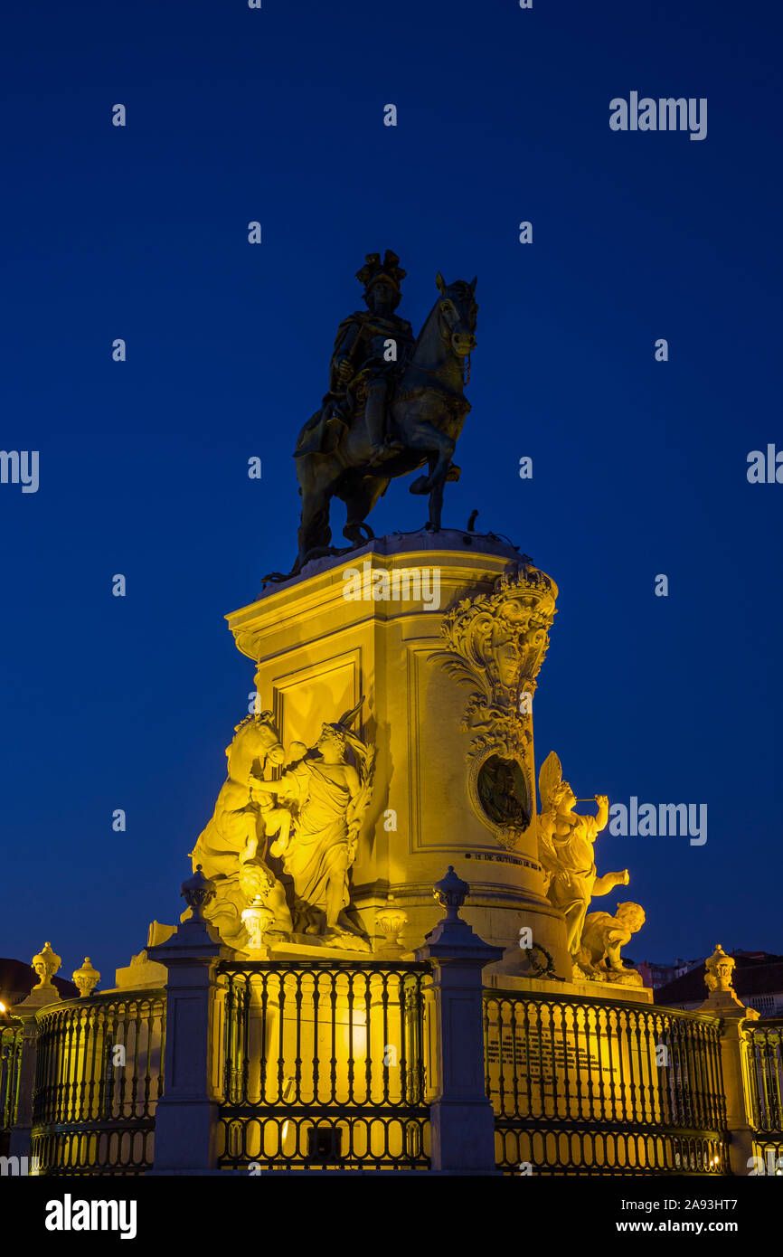 Illuminated statue of King Jose I at the Praca do Comercio square in Baixa district in Lisbon, Portugal, in the evening. Stock Photo