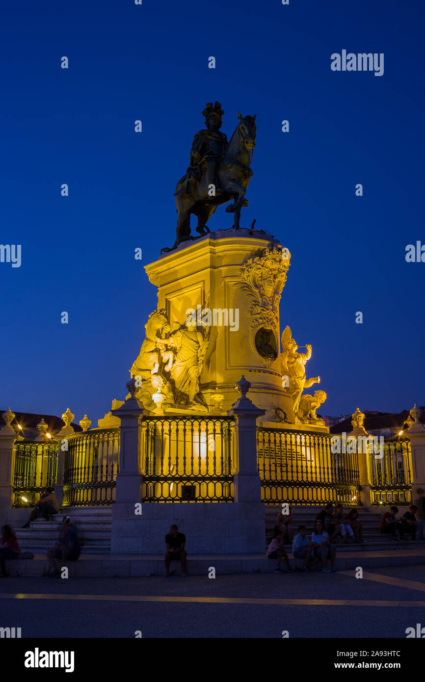 Illuminated statue of King Jose I at the Praca do Comercio square in Baixa district in Lisbon, Portugal, in the evening. Stock Photo