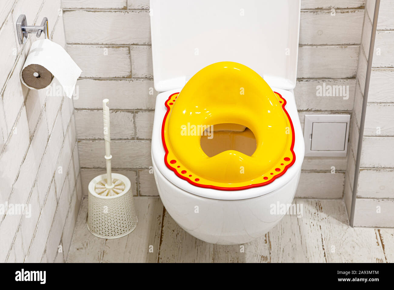 Yellow lid for toilet seat for children. How to accustom a child to the