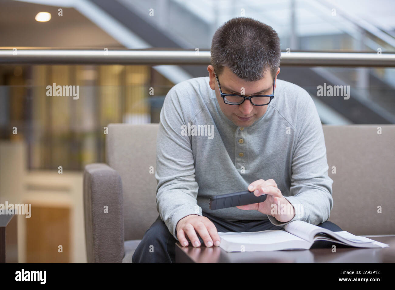 Man with Visual Impairment studying at school Stock Photo