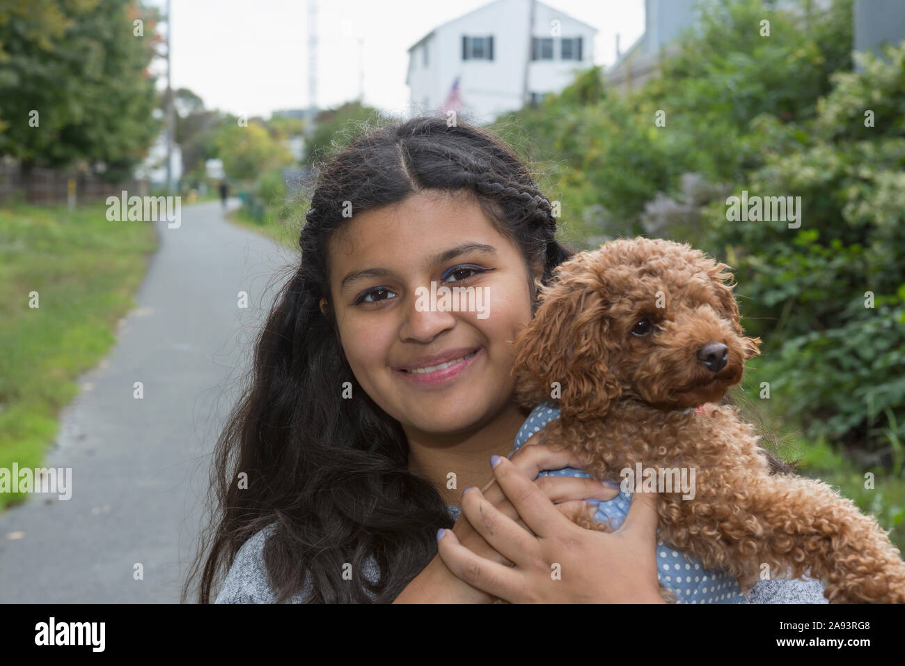Teen with Autism and her pet Stock Photo - Alamy