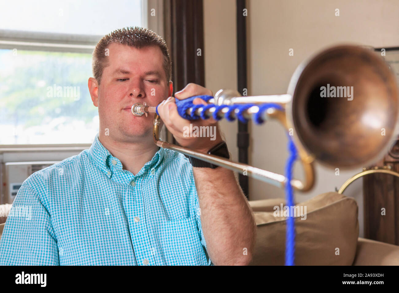 Musician with Visual Impairment playing bugle Stock Photo - Alamy