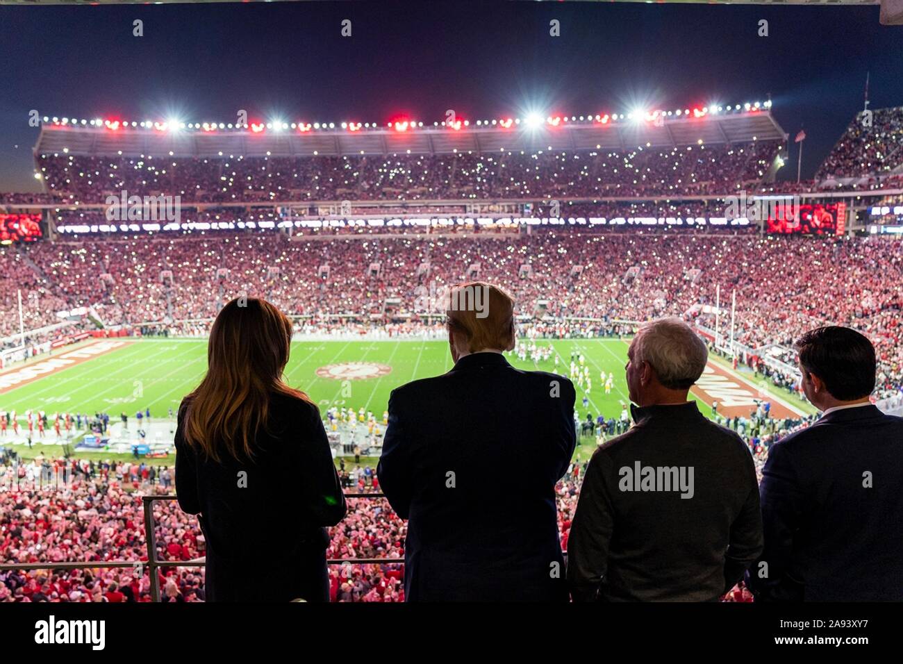 U.S President Donald Trump and First Lady Melania Trump watch the University of Alabama vs Louisiana State University football game at Bryant-Denny Stadium November 9, 2019 in Tuscaloosa, Alabama. Stock Photo