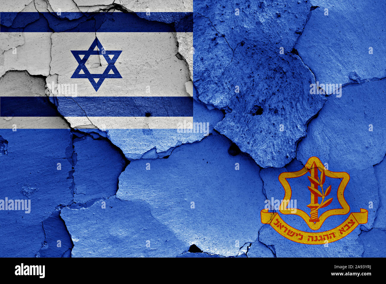 flag of Israel Defense Forces painted on cracked wall Stock Photo