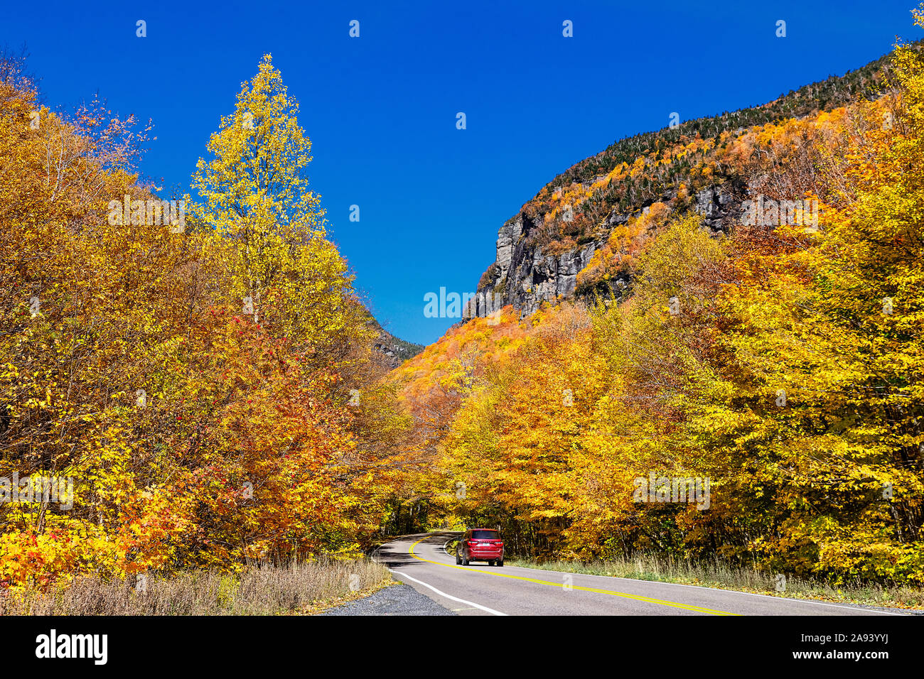 Scenic autumn drive through Smugglers Notch State Park, Vermont, USA. Stock Photo