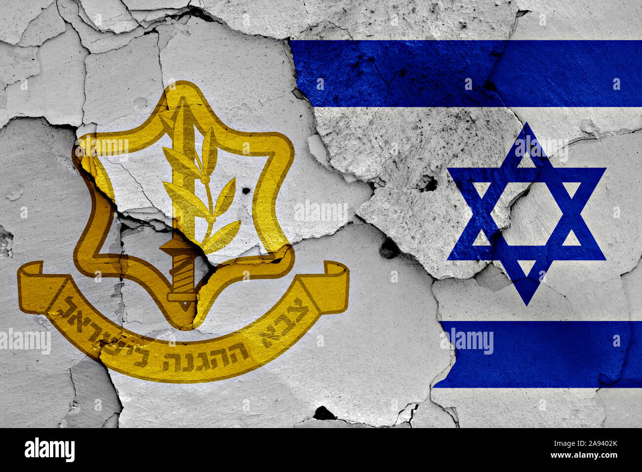 flags of Israel Defense Forces and Israel painted on cracked wall Stock Photo
