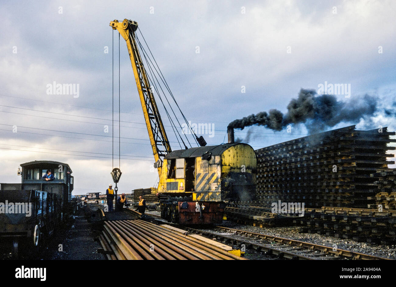 Steam powered crane at the British Rail Beighton depot, 1978 or 79.   Near Sheffield, Yorkshire, England, UK Stock Photo